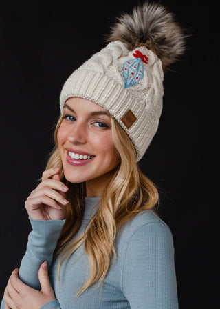 Beige Cable Knit Pom Hat w/ Embroidered Ornament